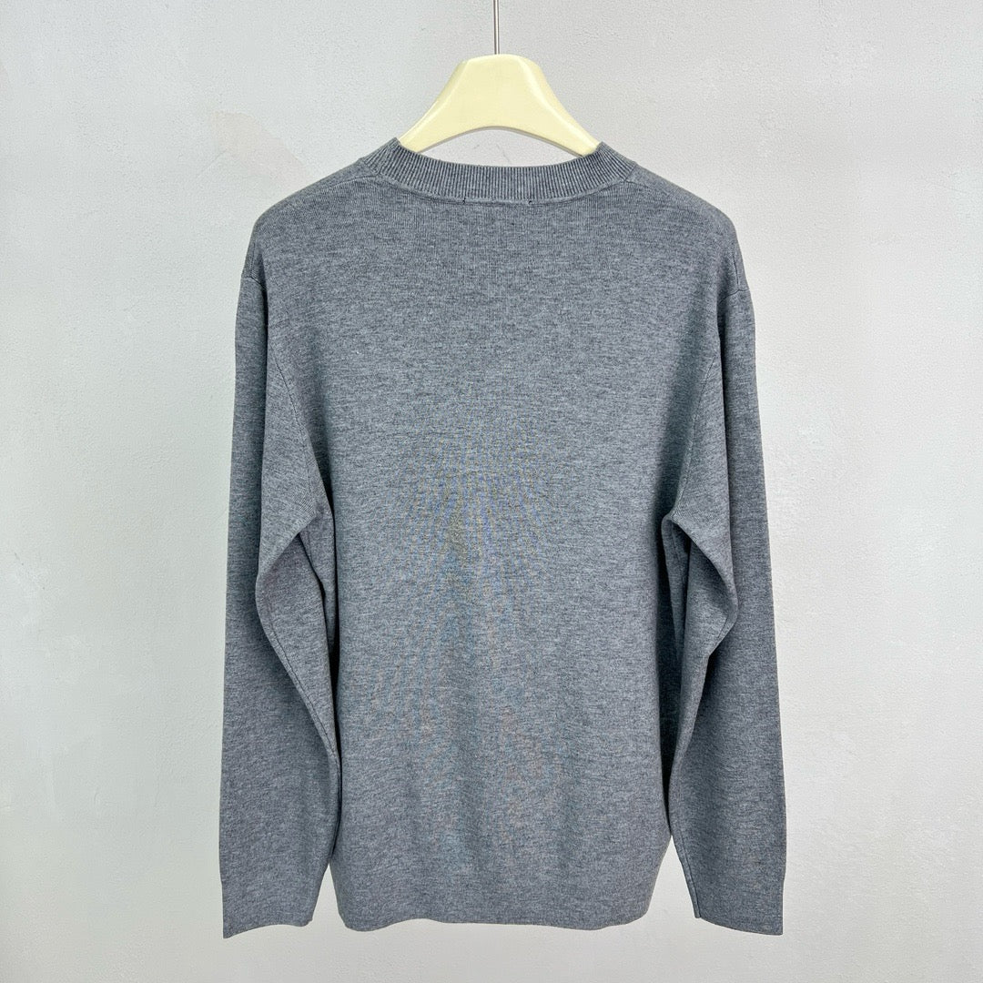 Jersey negro, gris y blanco