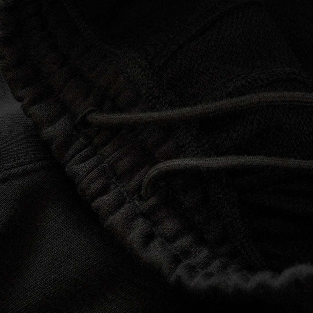 Pantalón negro y gris