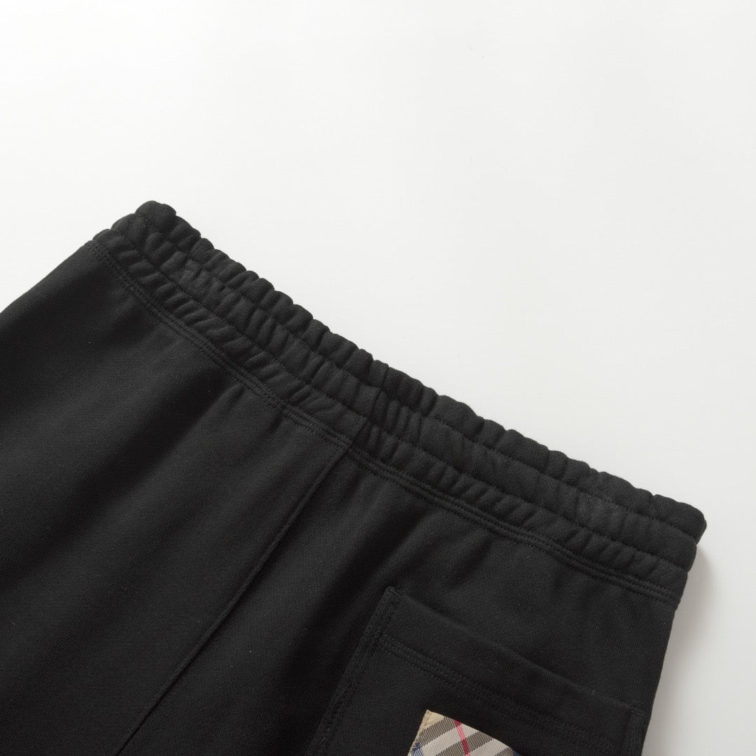 Pantalón negro y gris
