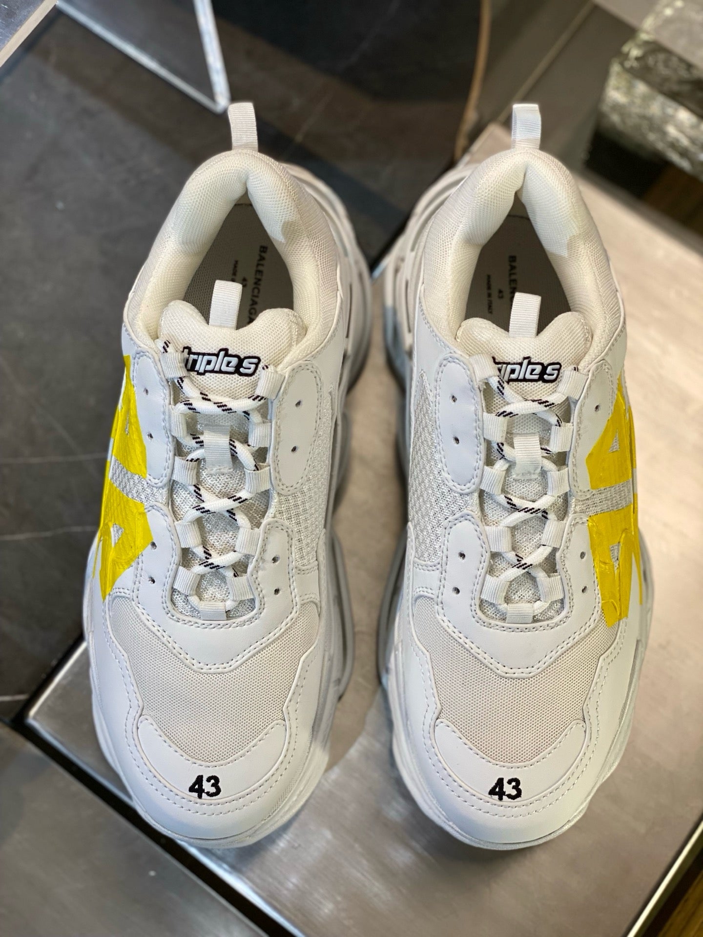White and Black Shoes