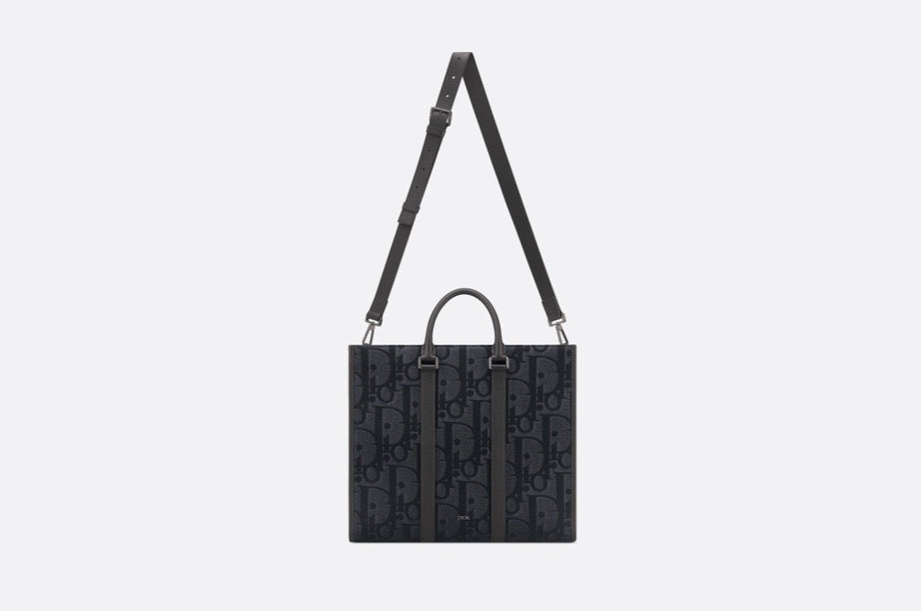 Blaue und schwarzgraue Tasche