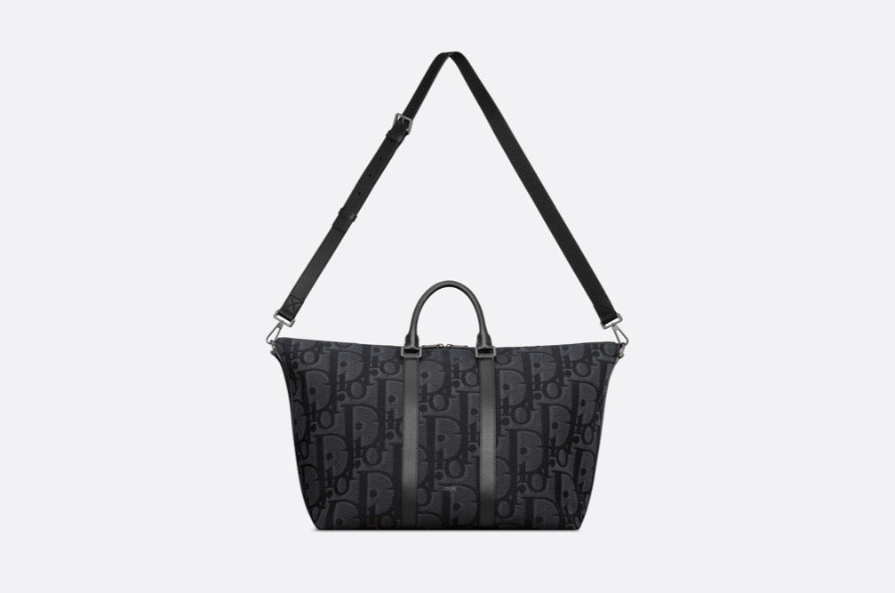 Blaue und schwarzgraue Tasche