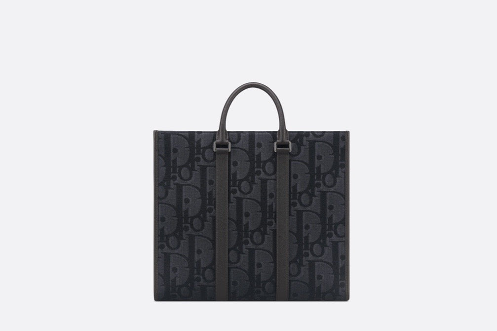 Blaue und schwarzgraue Tasche