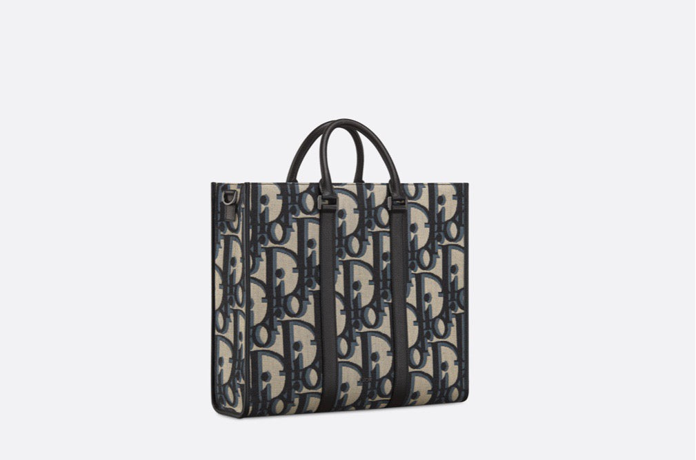 Blaue und schwarzgraue Tasche