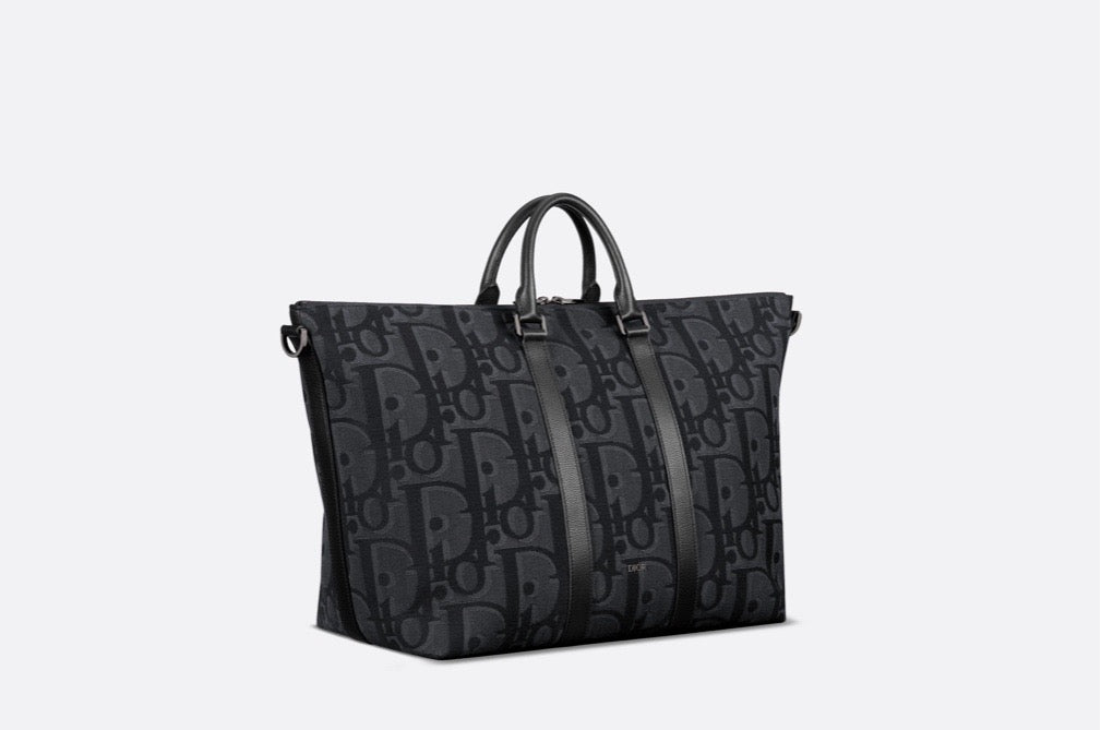 Blaue und schwarzgraue Tasche