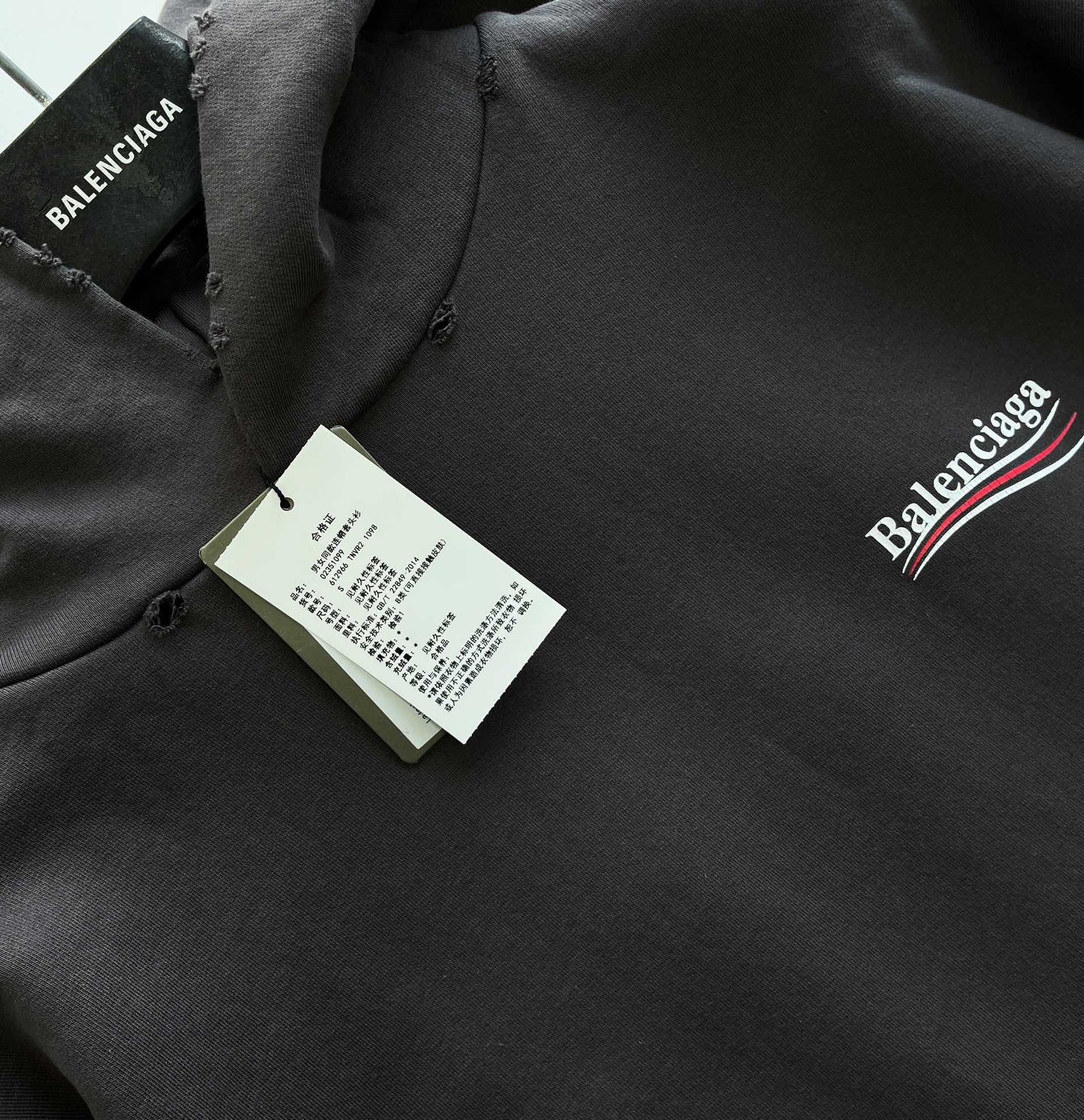 Sudadera con capucha azul cielo y gris oscuro