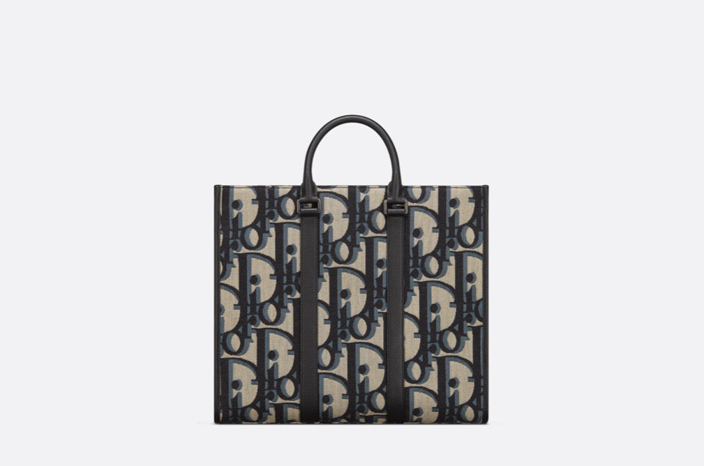 Blaue und schwarzgraue Tasche