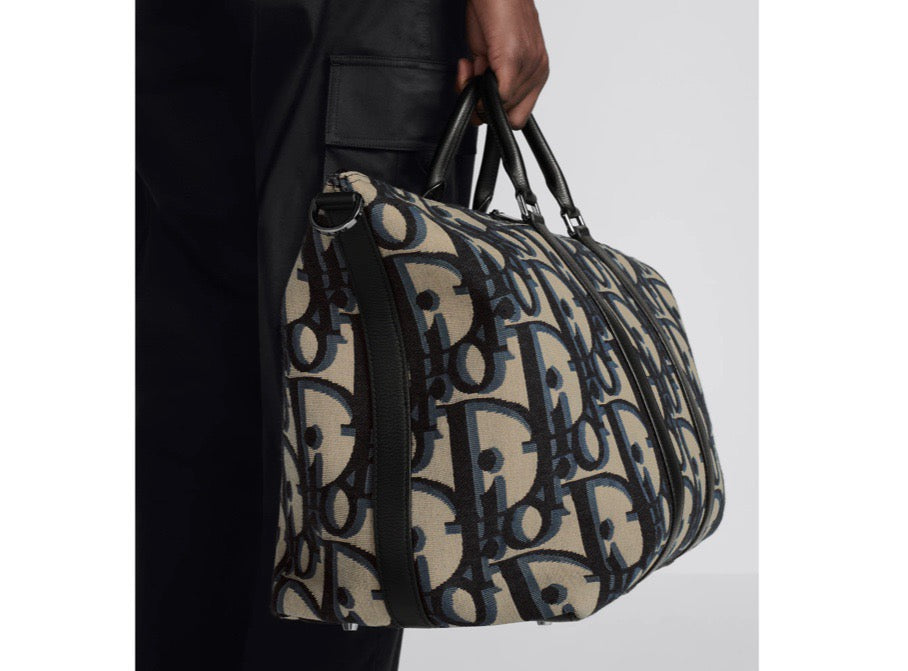 Blaue und schwarzgraue Tasche