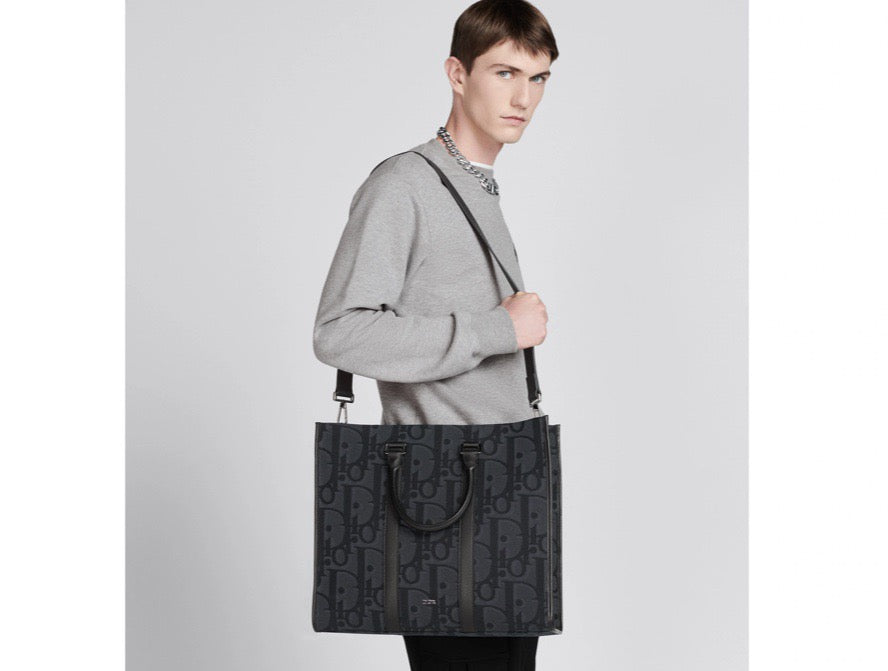Blaue und schwarzgraue Tasche