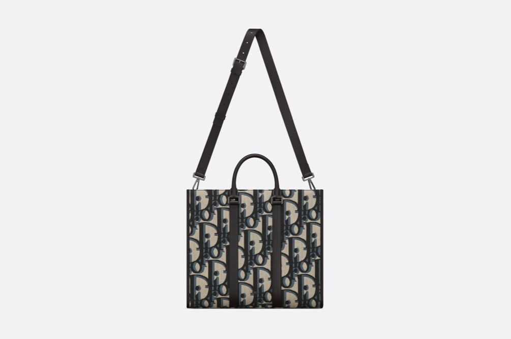Blaue und schwarzgraue Tasche