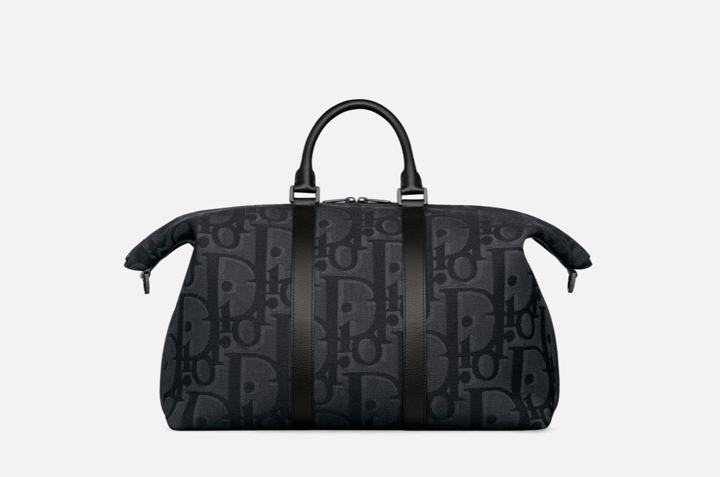 Blaue und schwarzgraue Tasche