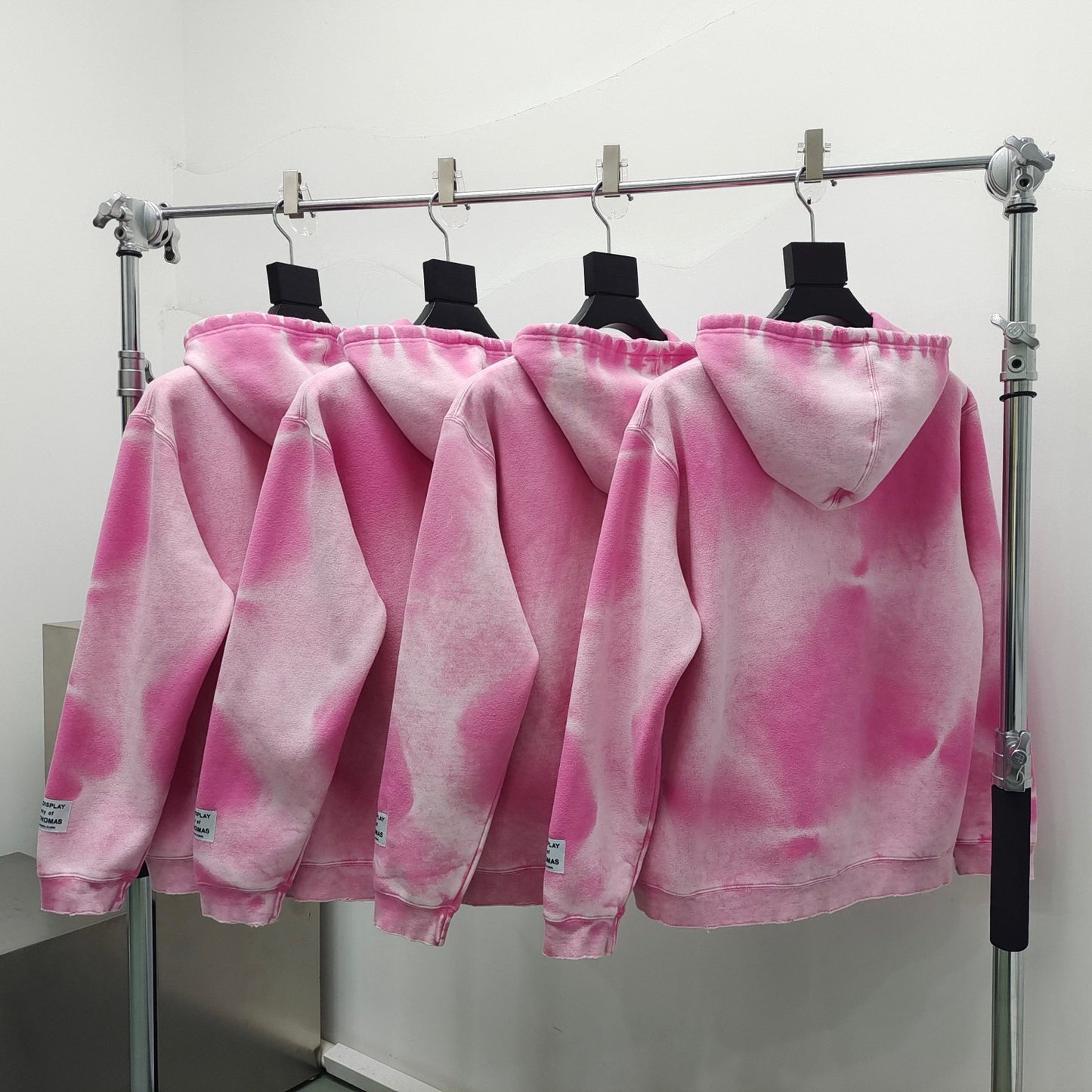 Sudadera con capucha amarilla y rosa