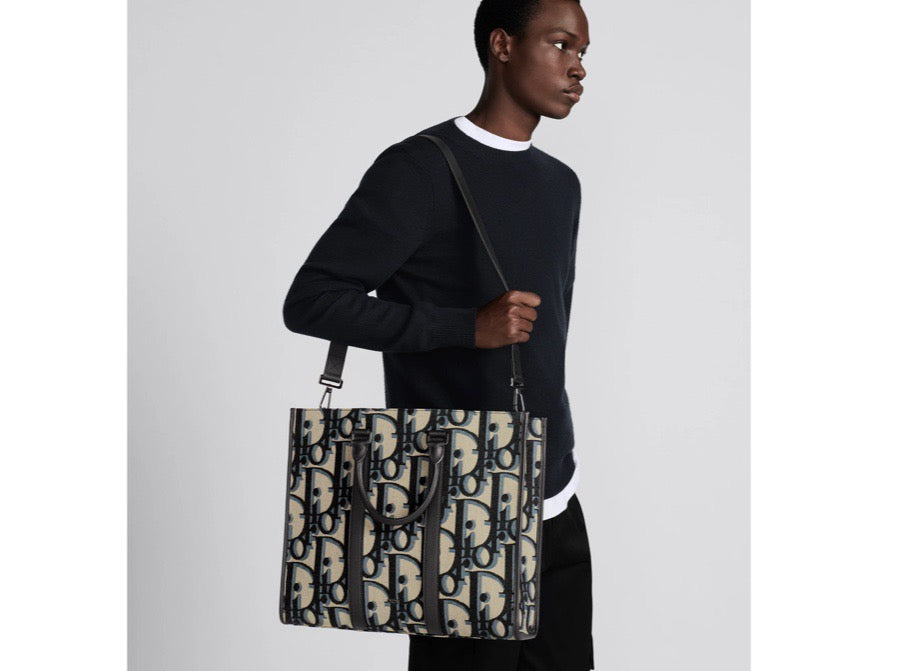 Blaue und schwarzgraue Tasche