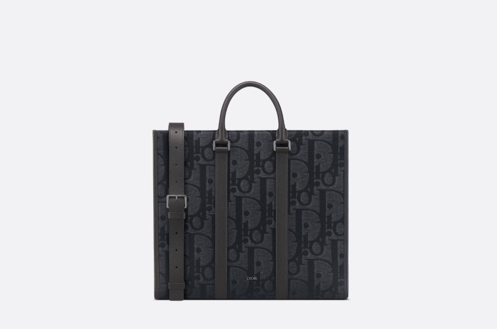 Blaue und schwarzgraue Tasche