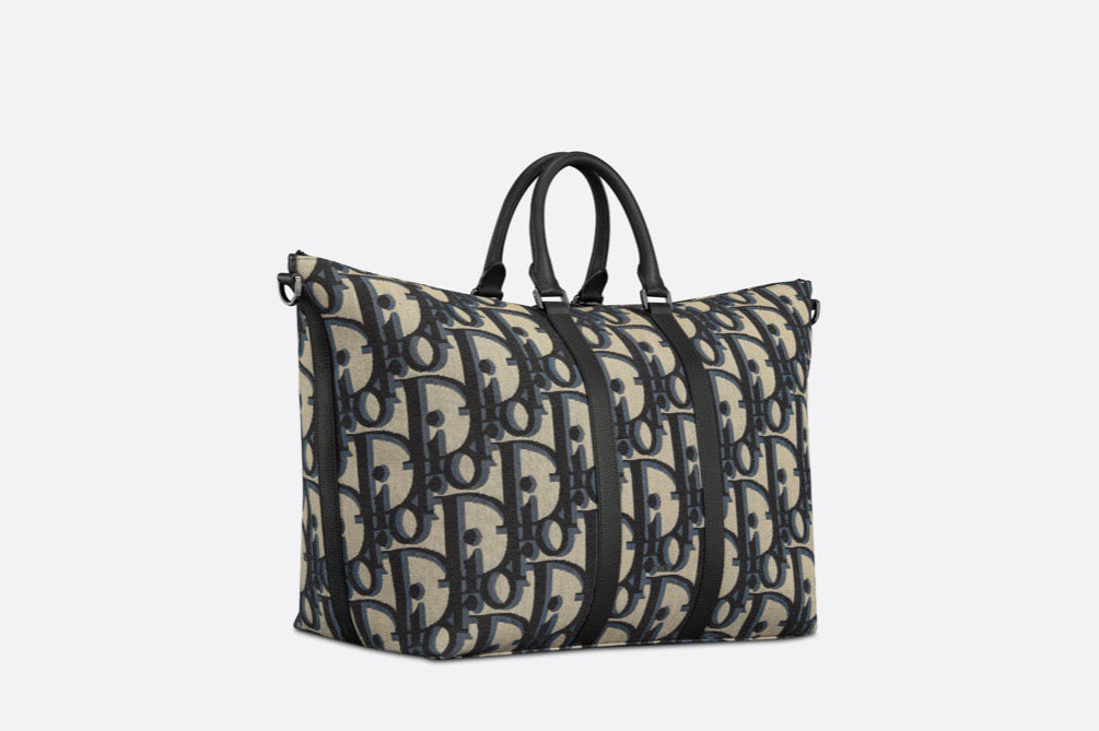 Blaue und schwarzgraue Tasche