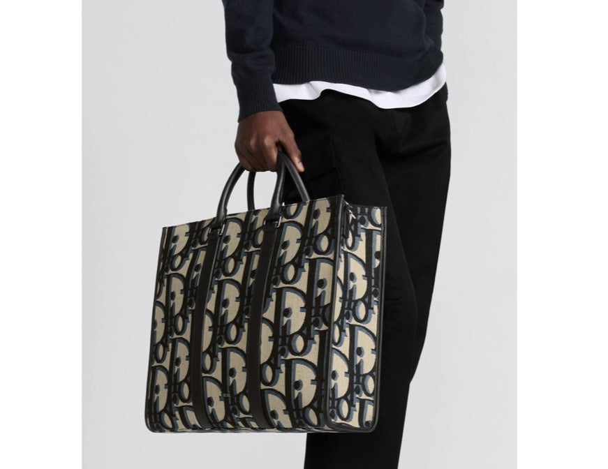 Blaue und schwarzgraue Tasche