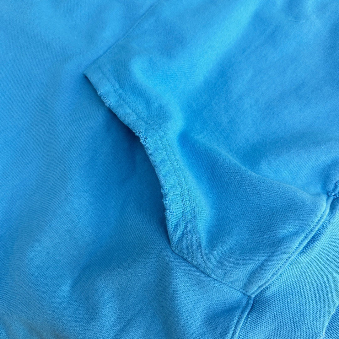 Sudadera con capucha azul cielo y gris oscuro