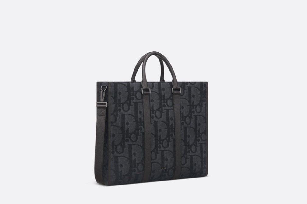 Blaue und schwarzgraue Tasche