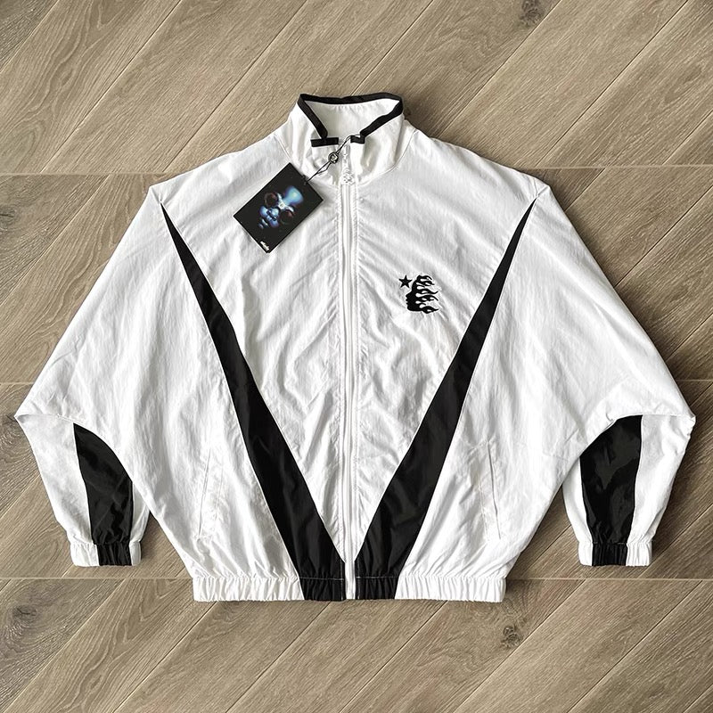 Weiß-schwarzes Trikot mit Hose
