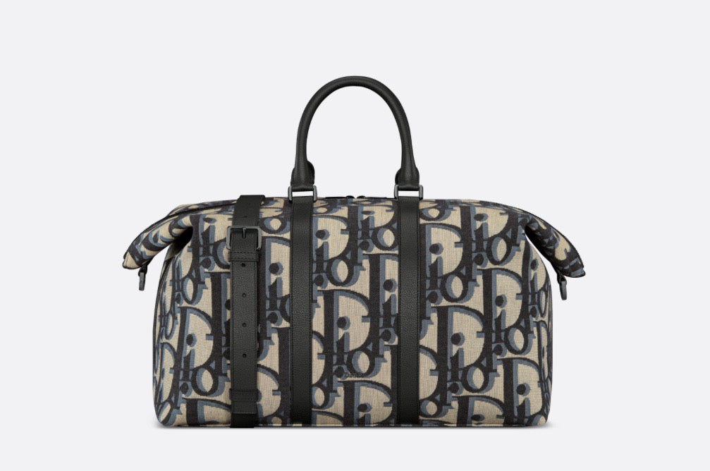 Blaue und schwarzgraue Tasche