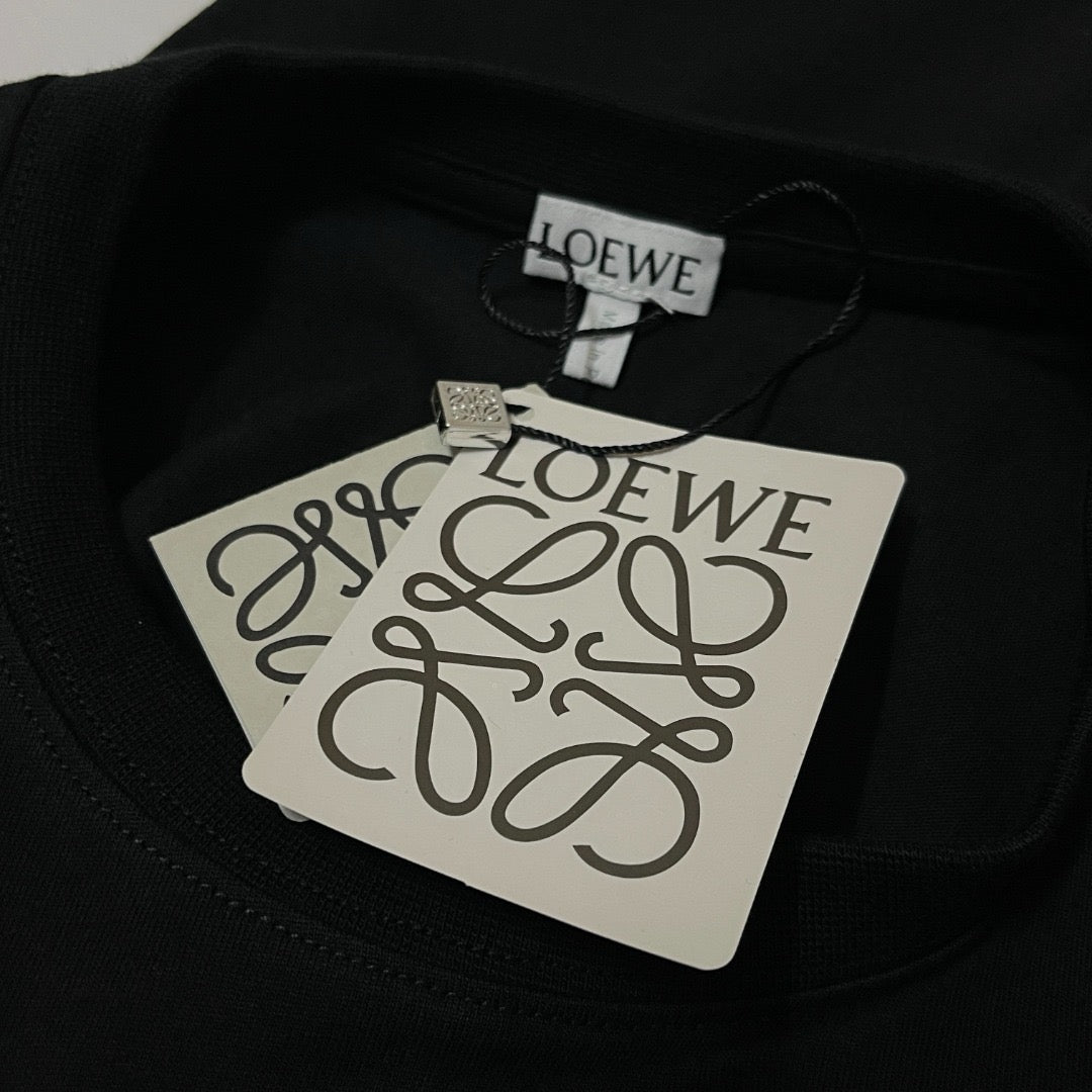 Camiseta blanca, negra y verde
