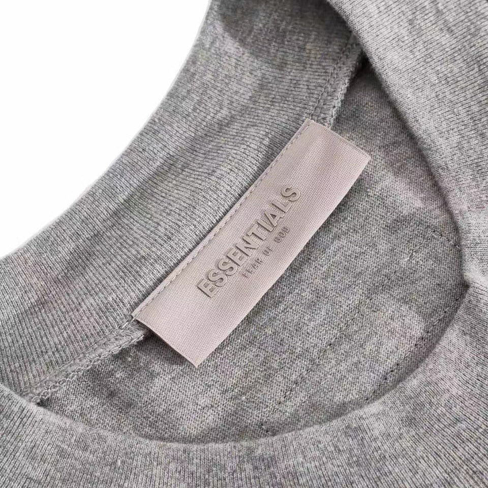 Camiseta gris claro, gris oscuro y negra