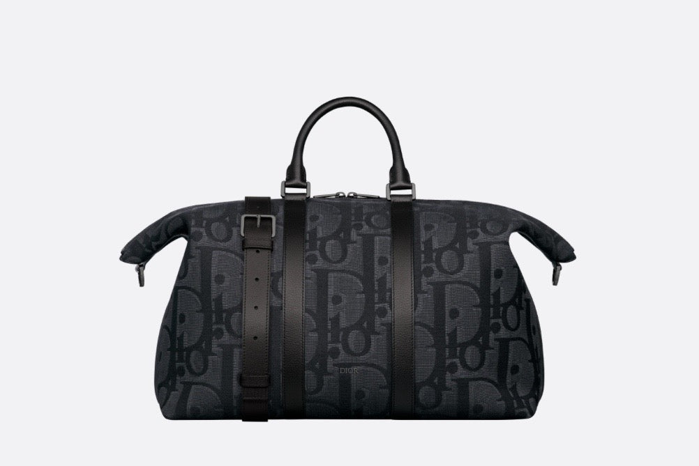 Blaue und schwarzgraue Tasche