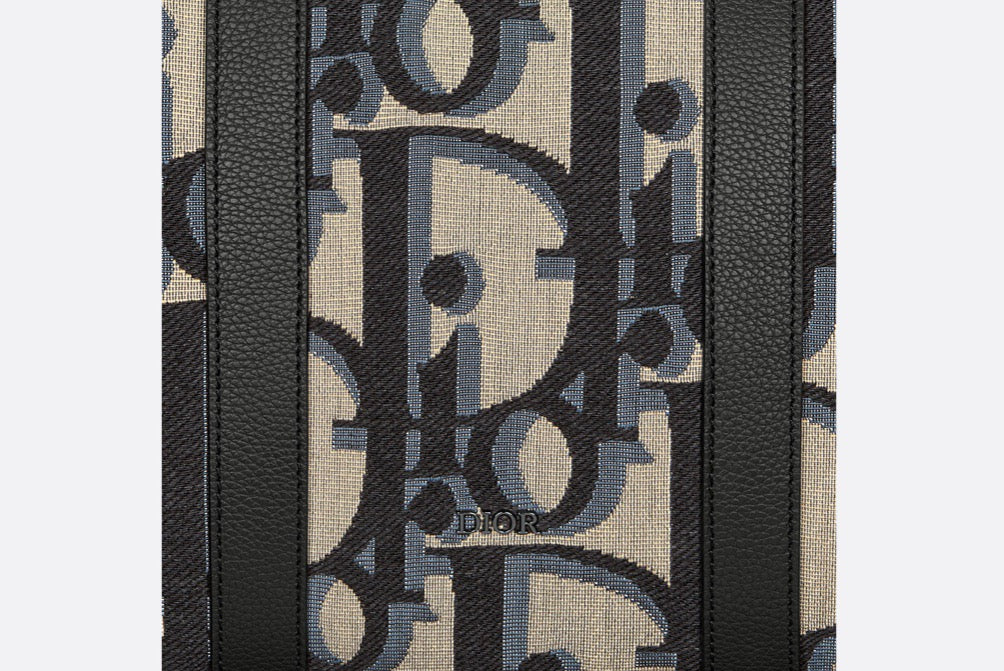 Blaue und schwarzgraue Tasche