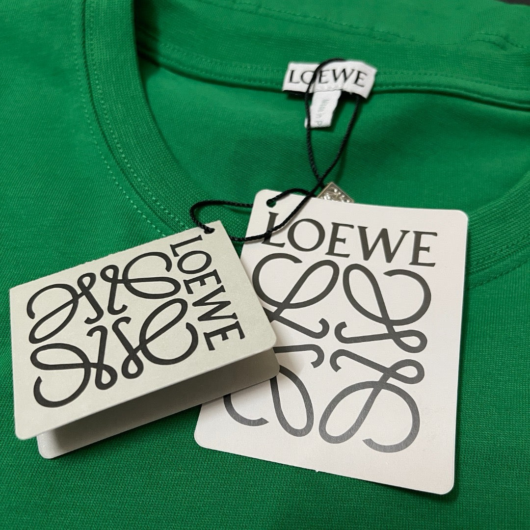 Camiseta blanca, negra y verde