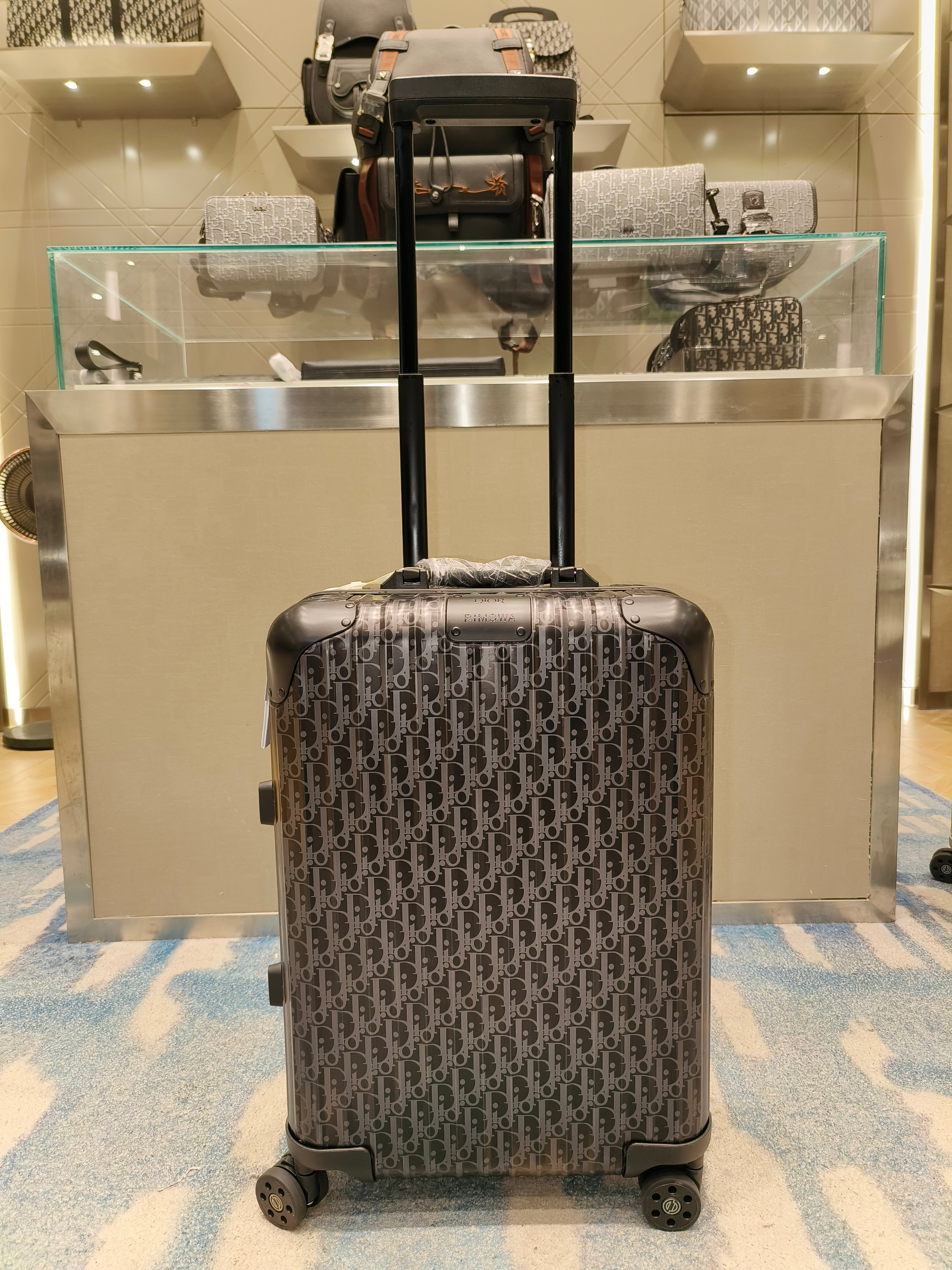 Black, Silver and Brown Suitcase