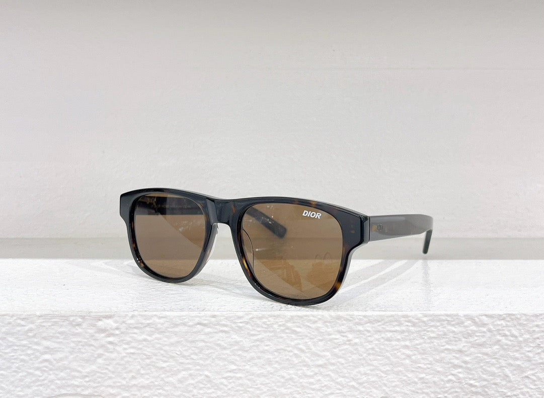 Schwarze, weiße und braune Sonnenbrille