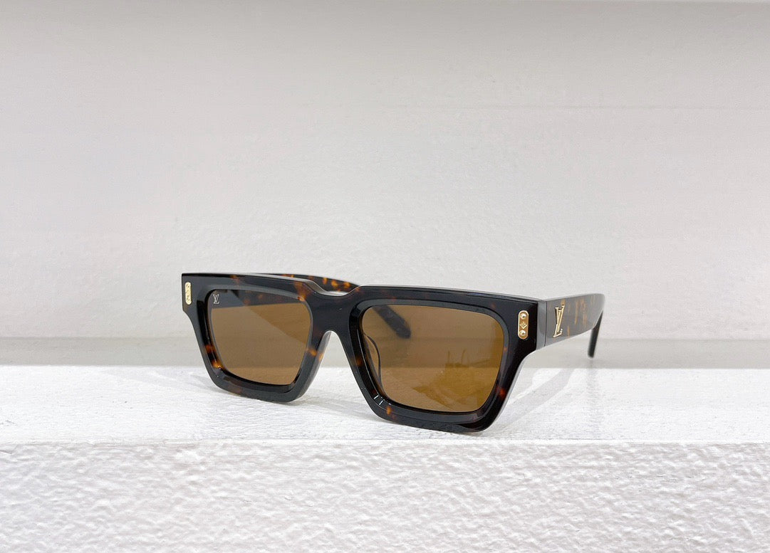 Gafas de sol negras, marrones y blancas