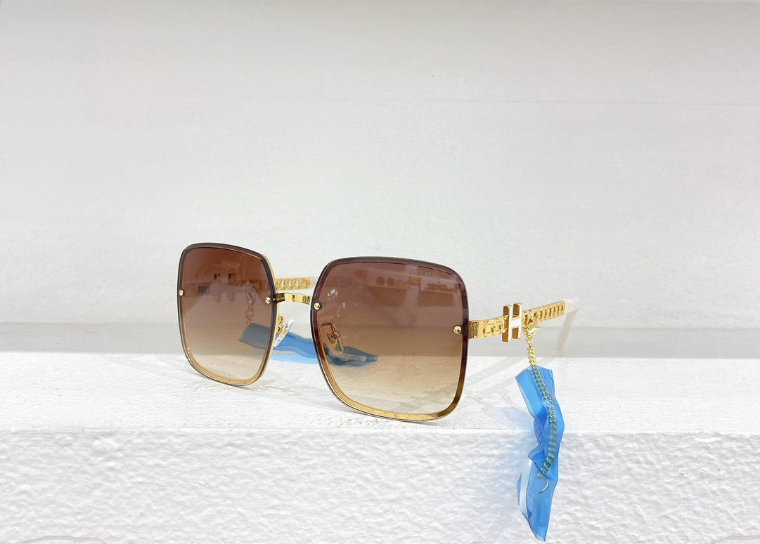 Braune, schwarze und blaue Sonnenbrille