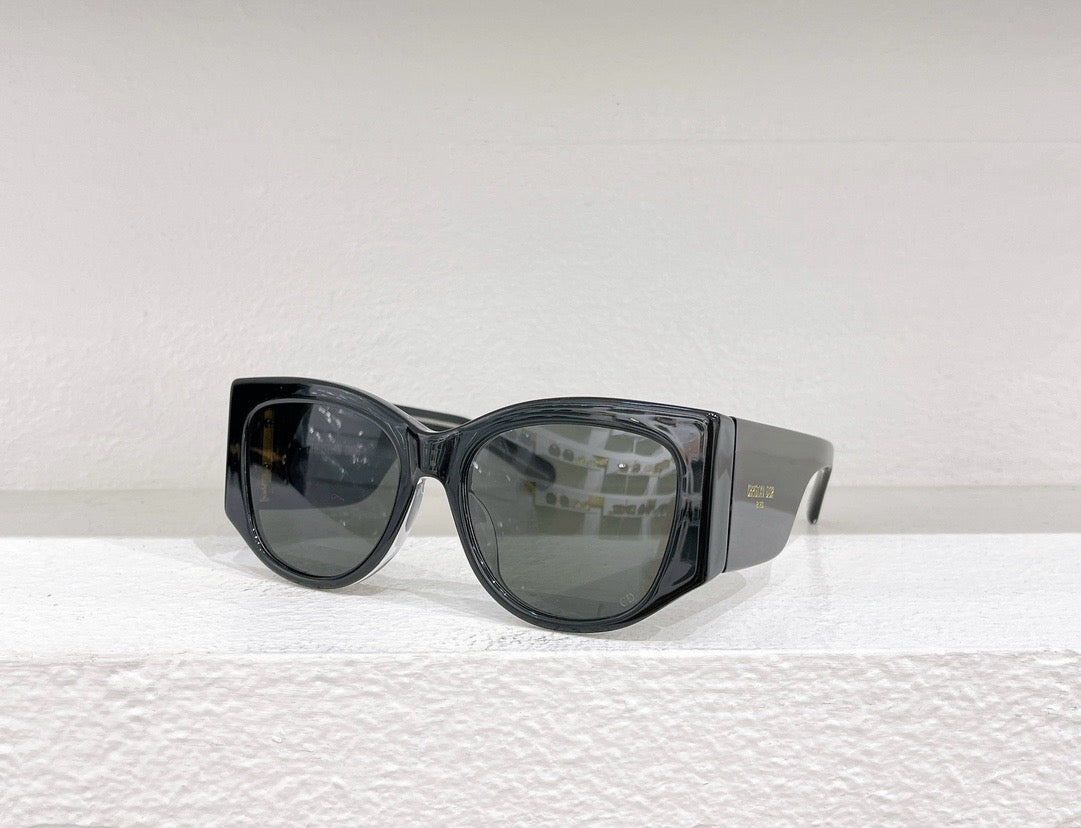 Schwarze, braune und weiße Sonnenbrille
