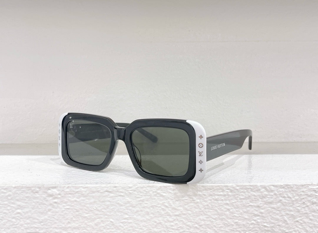 Gafas de sol negras, marrones, blancas y rosas