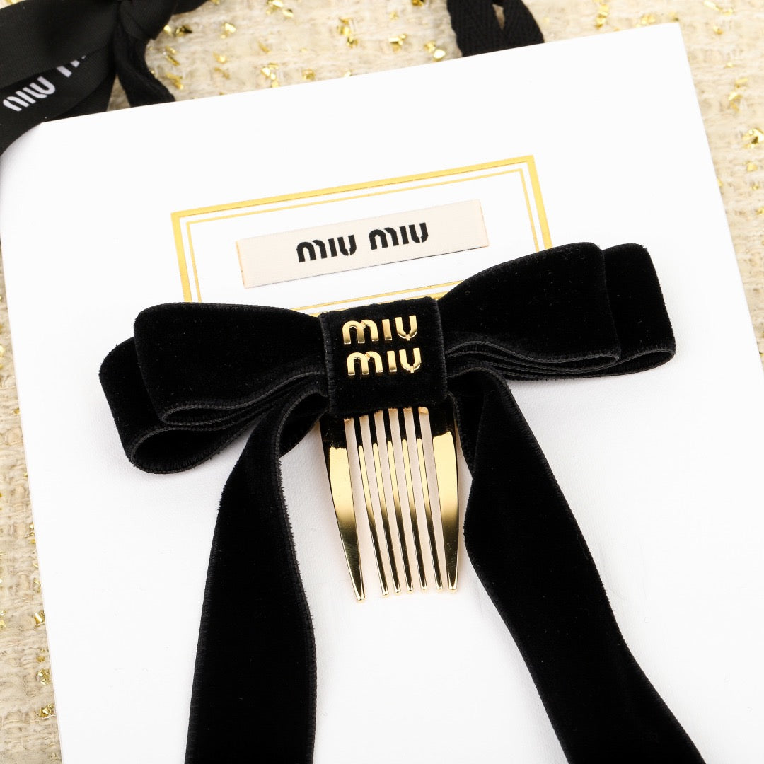 Schwarzgold-Clip