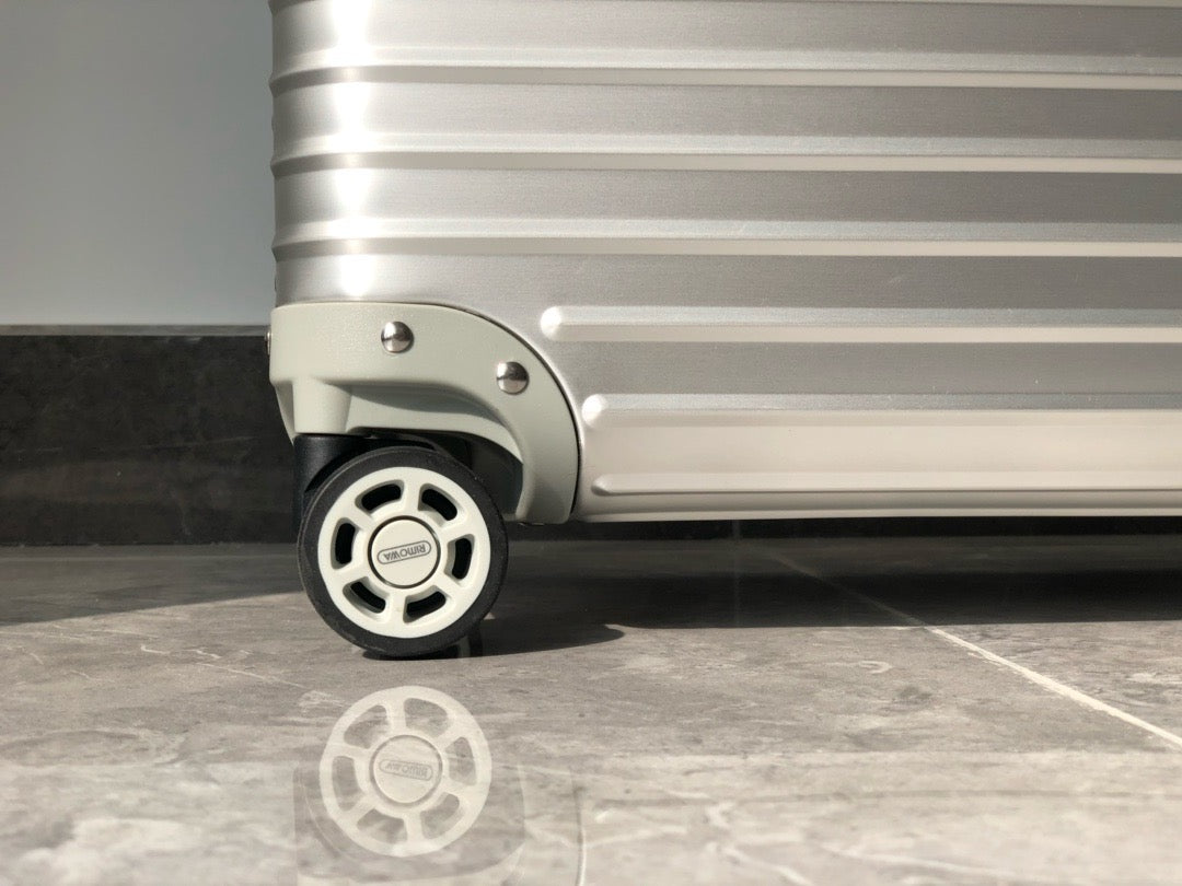 Silver and Black Suitcase