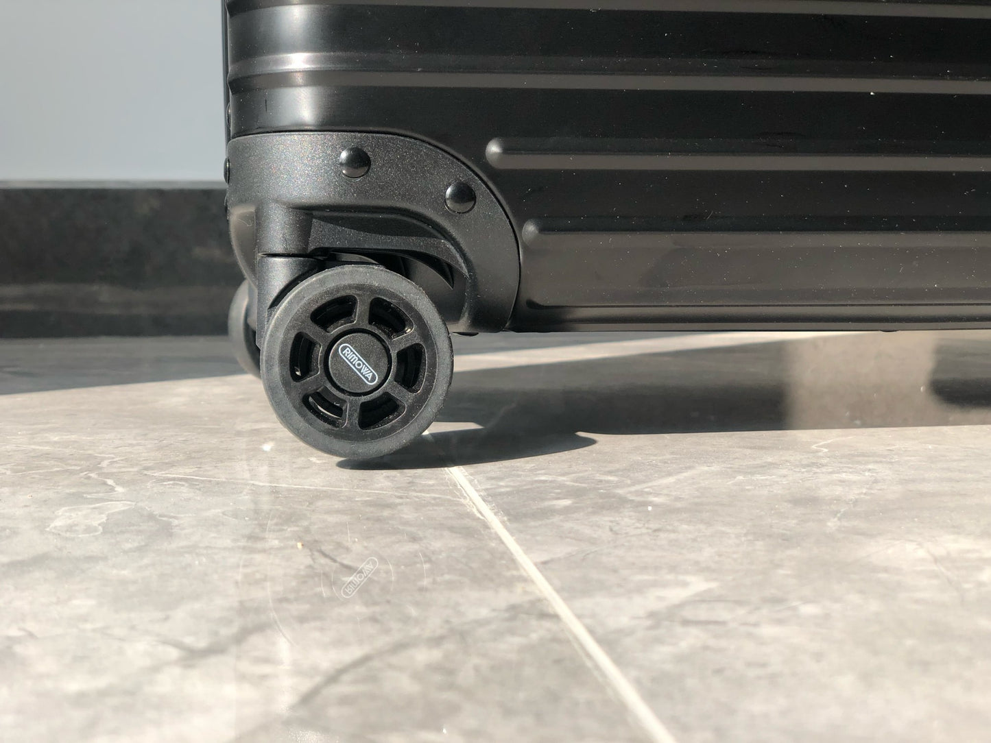 Silver and Black Suitcase