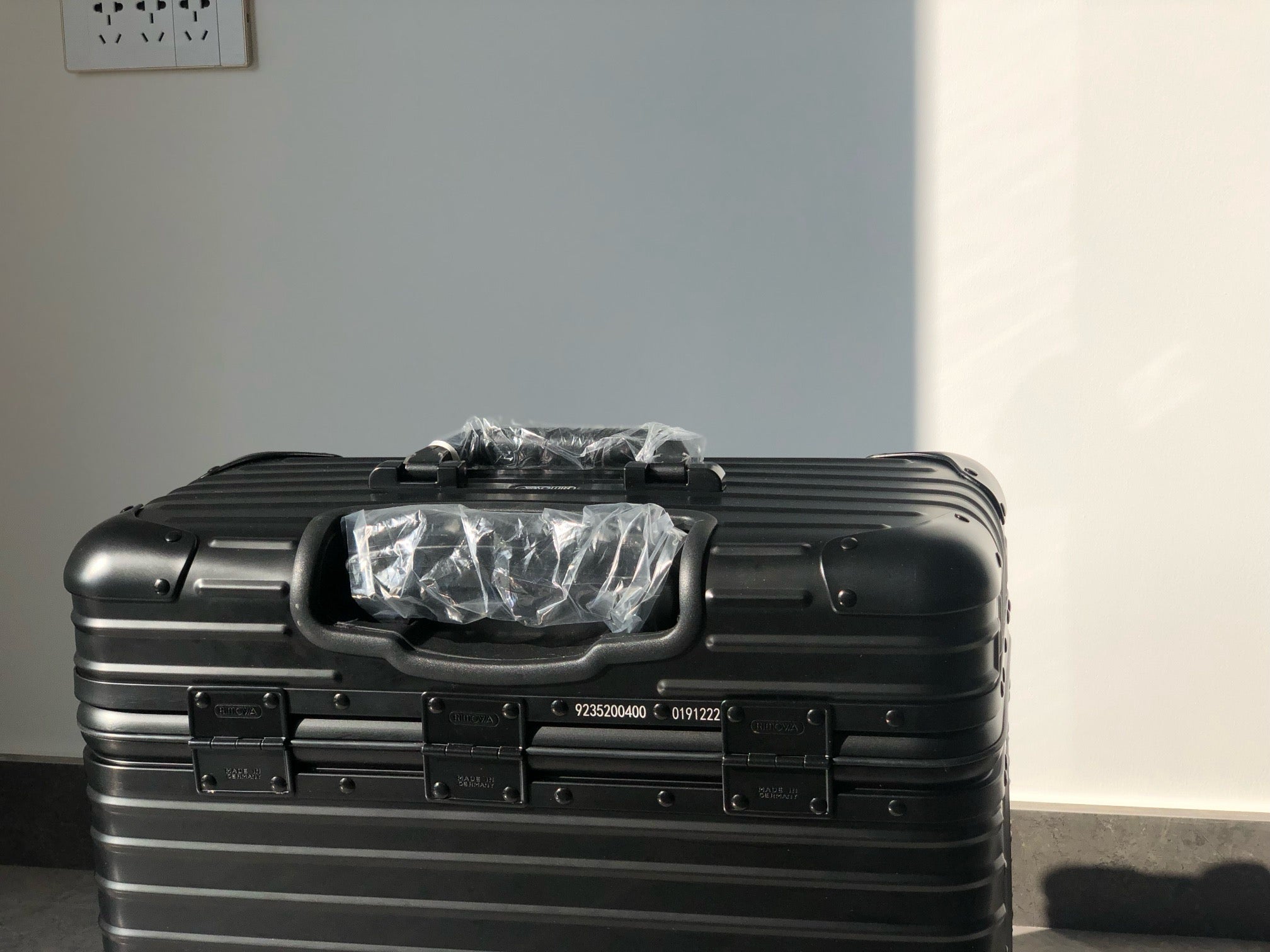 Silver and Black Suitcase