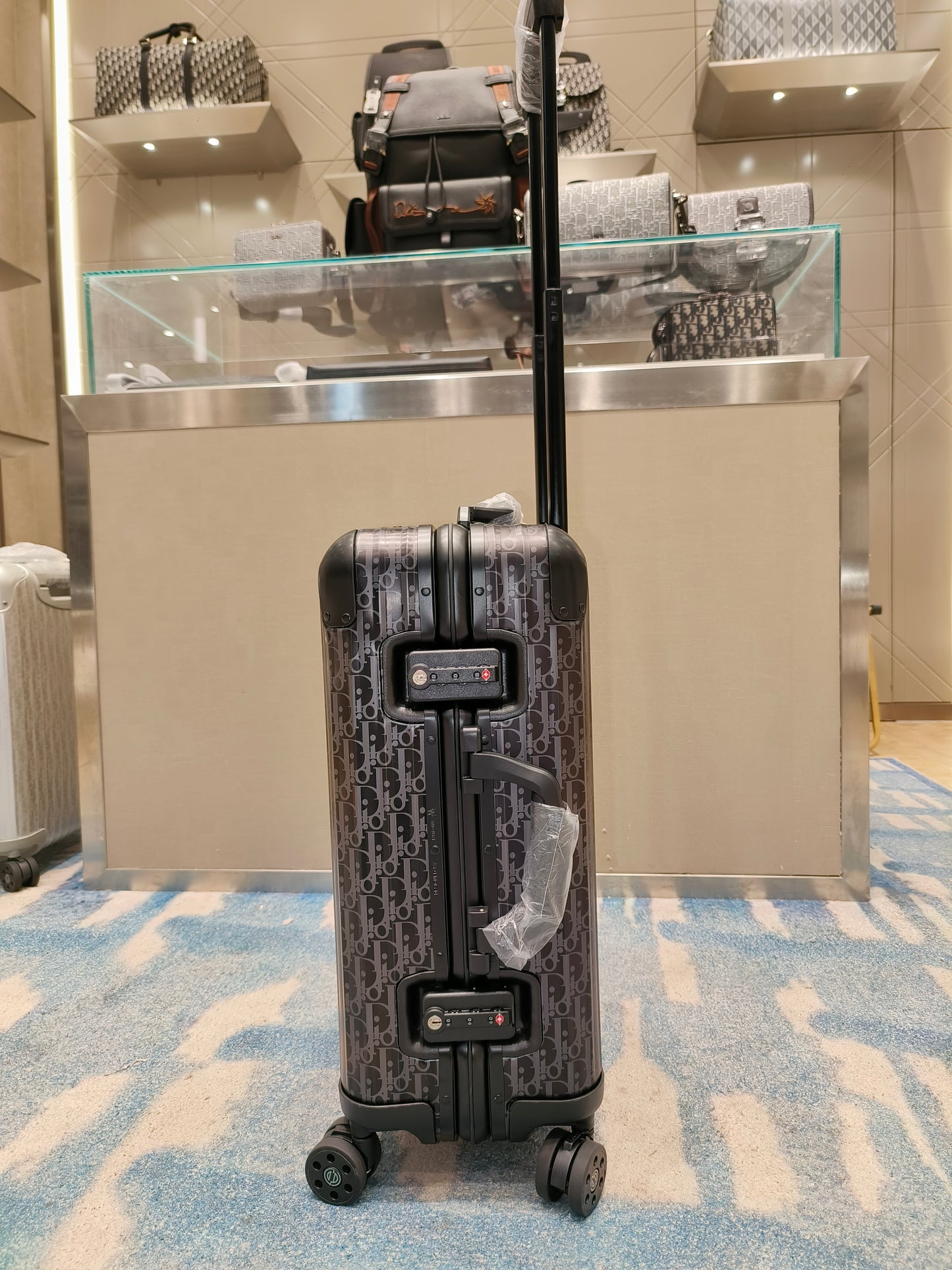 Black, Silver and Brown Suitcase