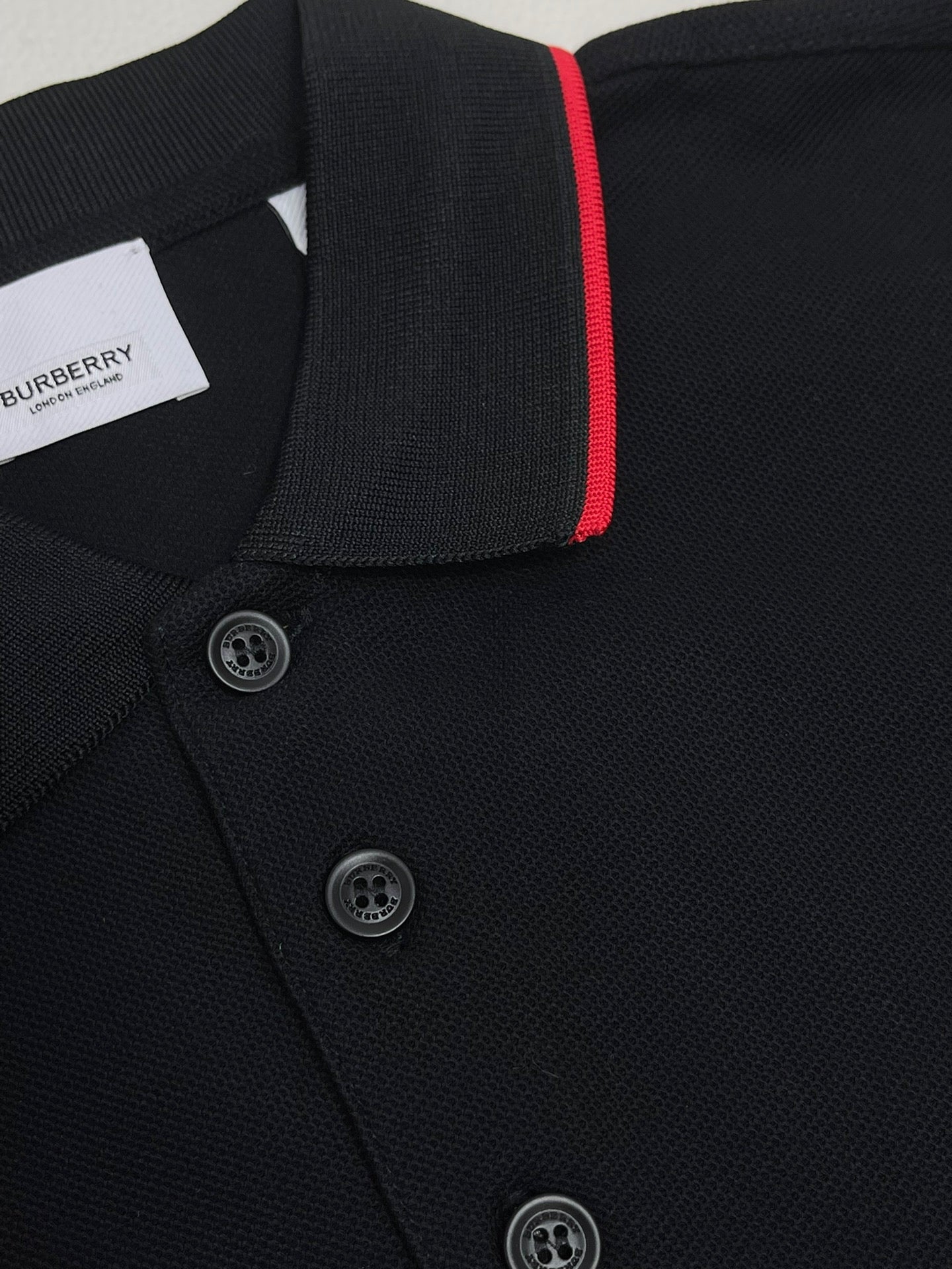 Black, White, Navy blue and Light blue Polo